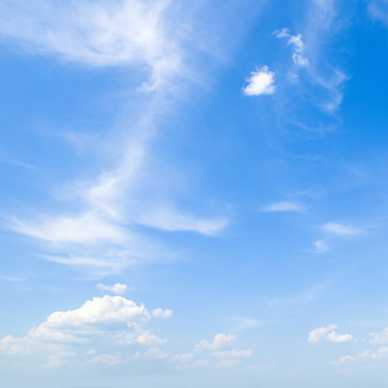 blue sky and cumulus clouds.